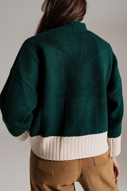 Green Jumper With White Ribbed Cuffs and Hem