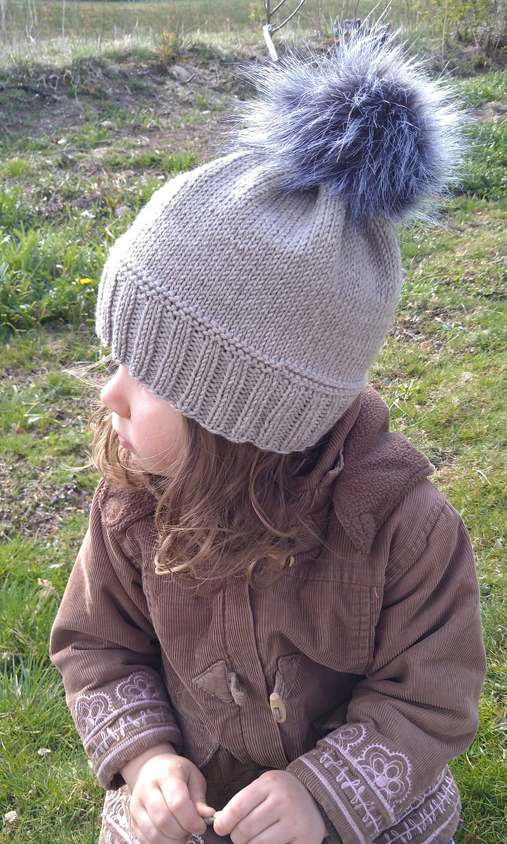 Gray Knitted Hat With Pompom