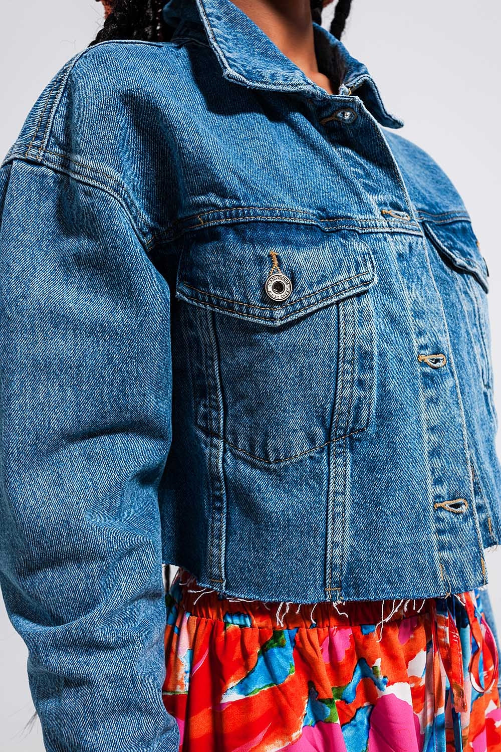 Cropped Denim Jacket With Raw Hem in Mid Wash